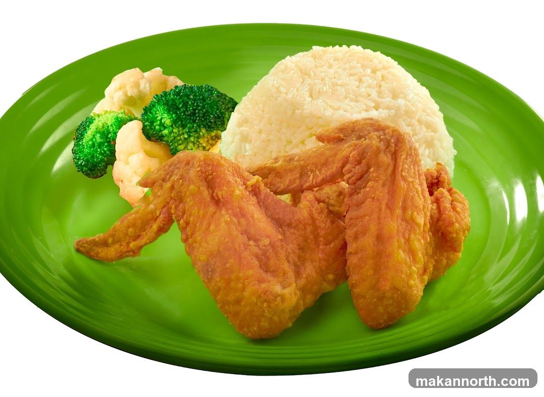 Fried Chicken Wings with Rice and Vegetables