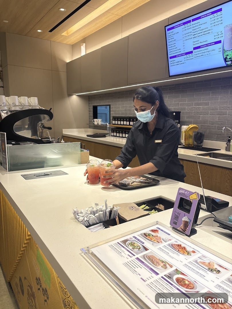 Barista preparing drinks