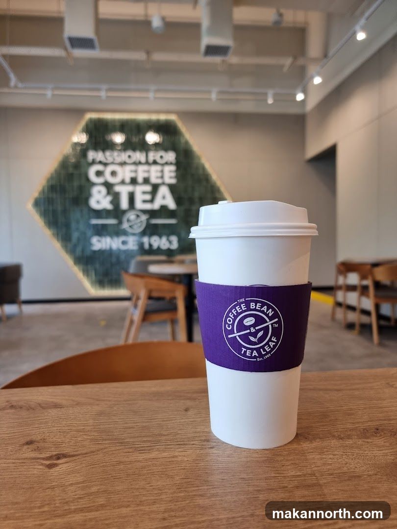 Coffee cup with The Coffee Bean & Tea Leaf branding