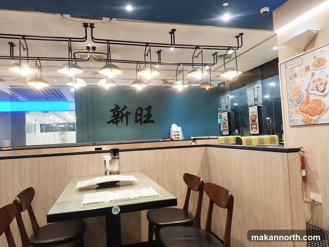 Restaurant Interior with Seating and Signage