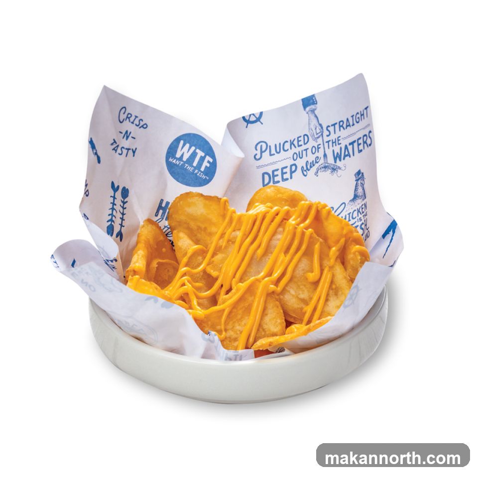 Fish and Chips with Cheese Sauce