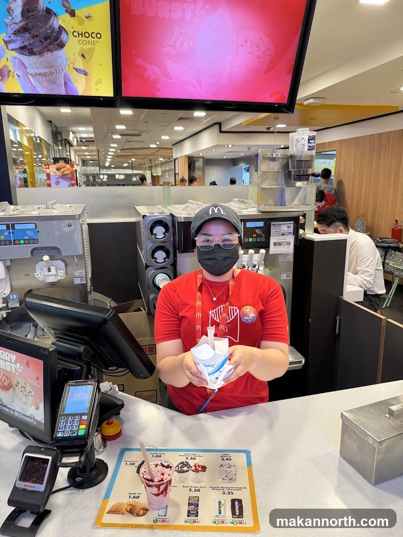 McDonald's Employee Serving Ice Cream