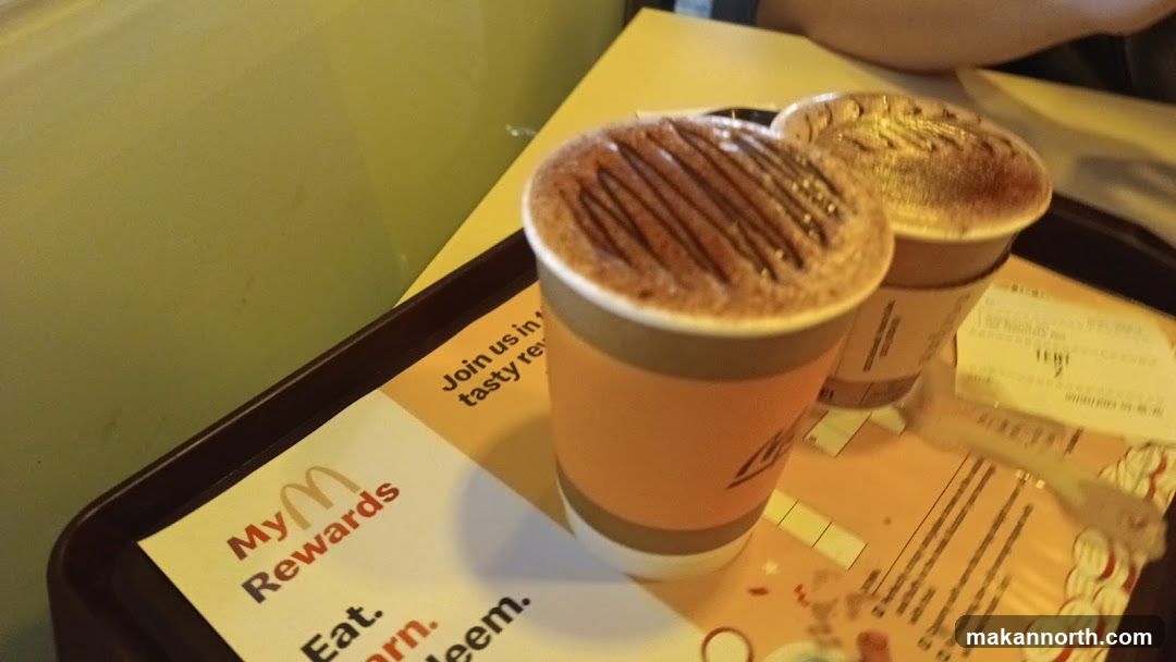 Two coffees on a tray