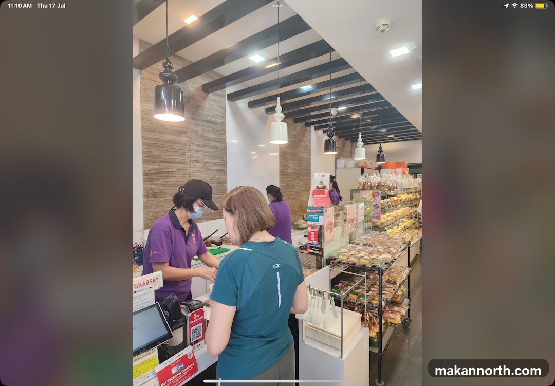 Bakery Interior with Staff and Customers