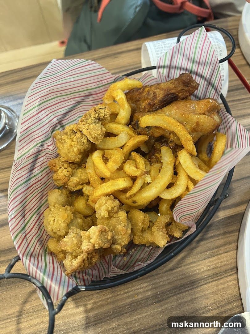 Basket of Fried Chicken and Curly Fries