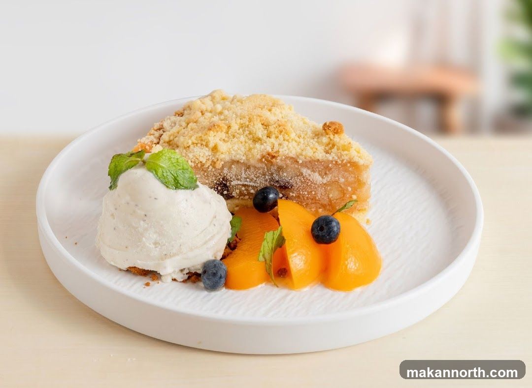 Apple Crumble with Ice Cream and Peaches