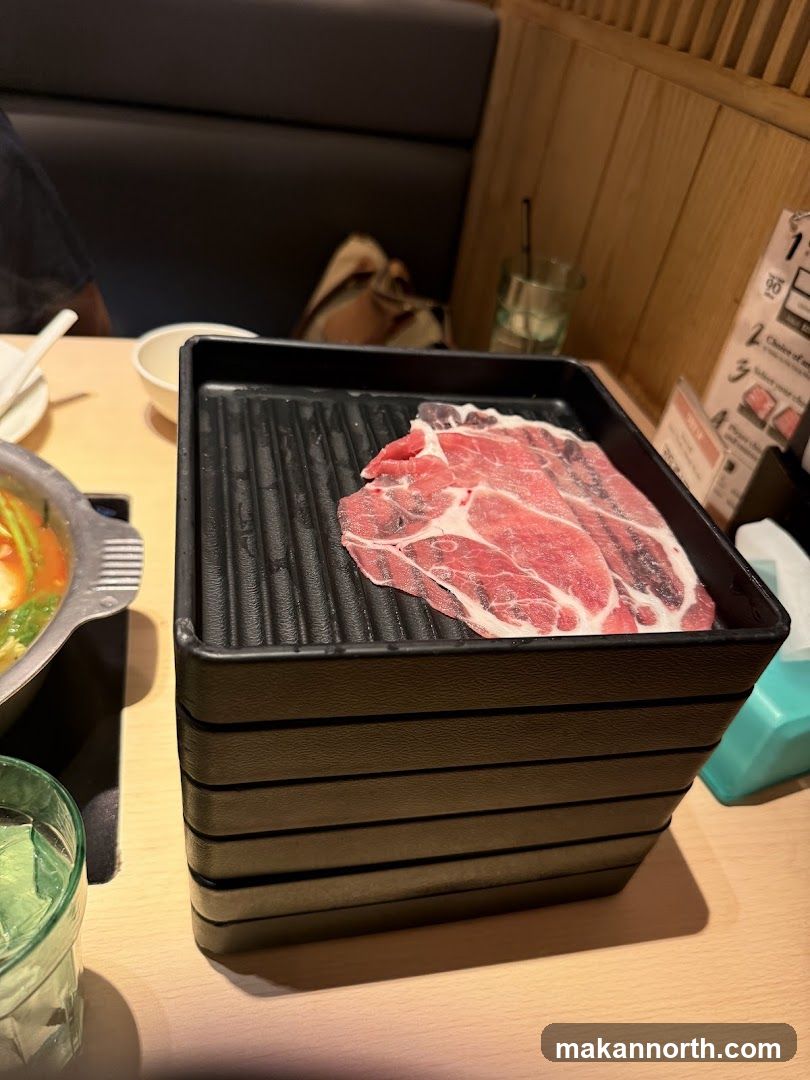 Thinly Sliced Raw Meat on a Tray