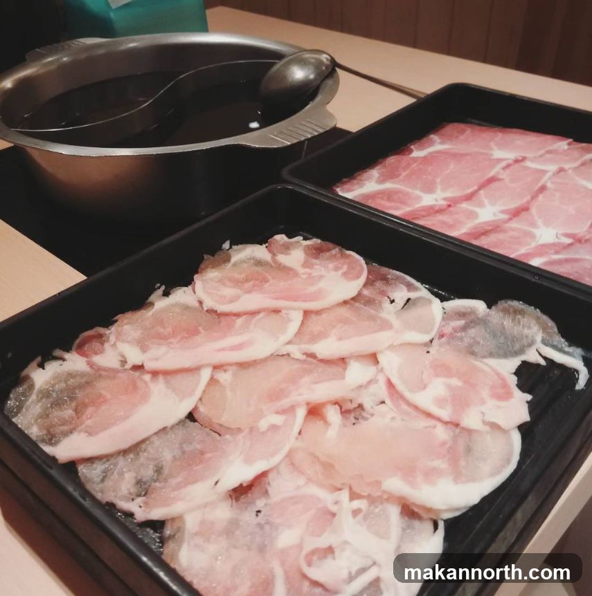 Sliced Meat and Broth for Hot Pot