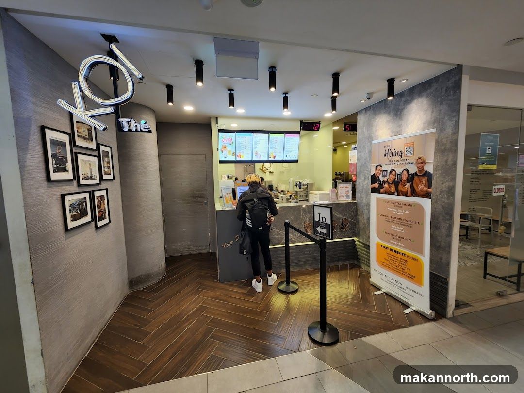 Tea shop counter with hiring poster