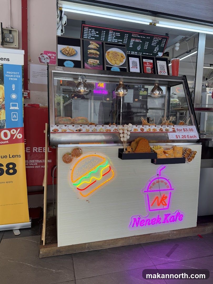 Food stall with neon signs