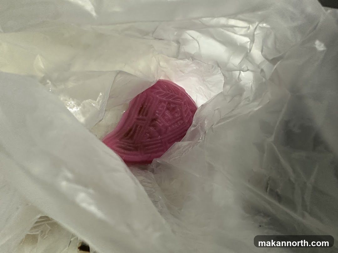 Pink Pastry in Plastic Bag