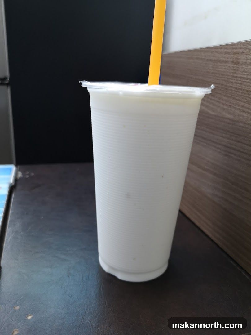White Drink with Yellow Straw