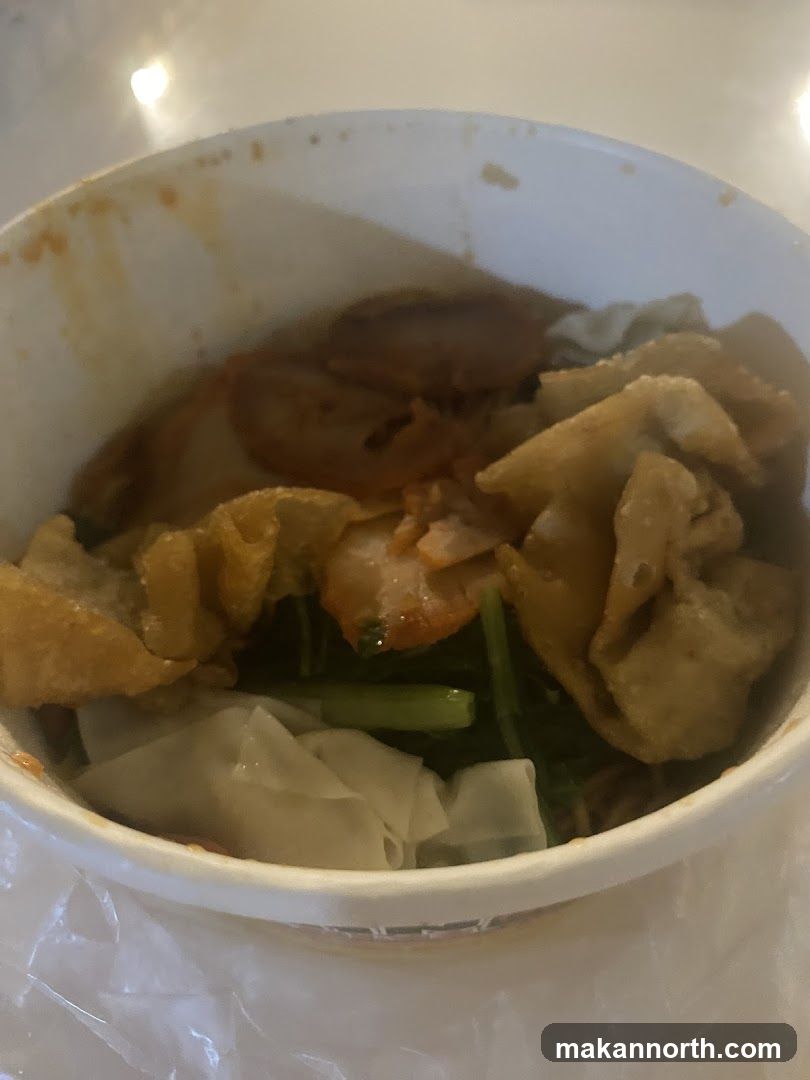 Noodle Soup with Wontons and Greens