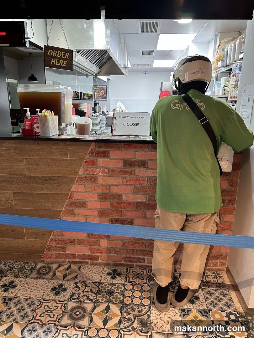 Order counter with a delivery person