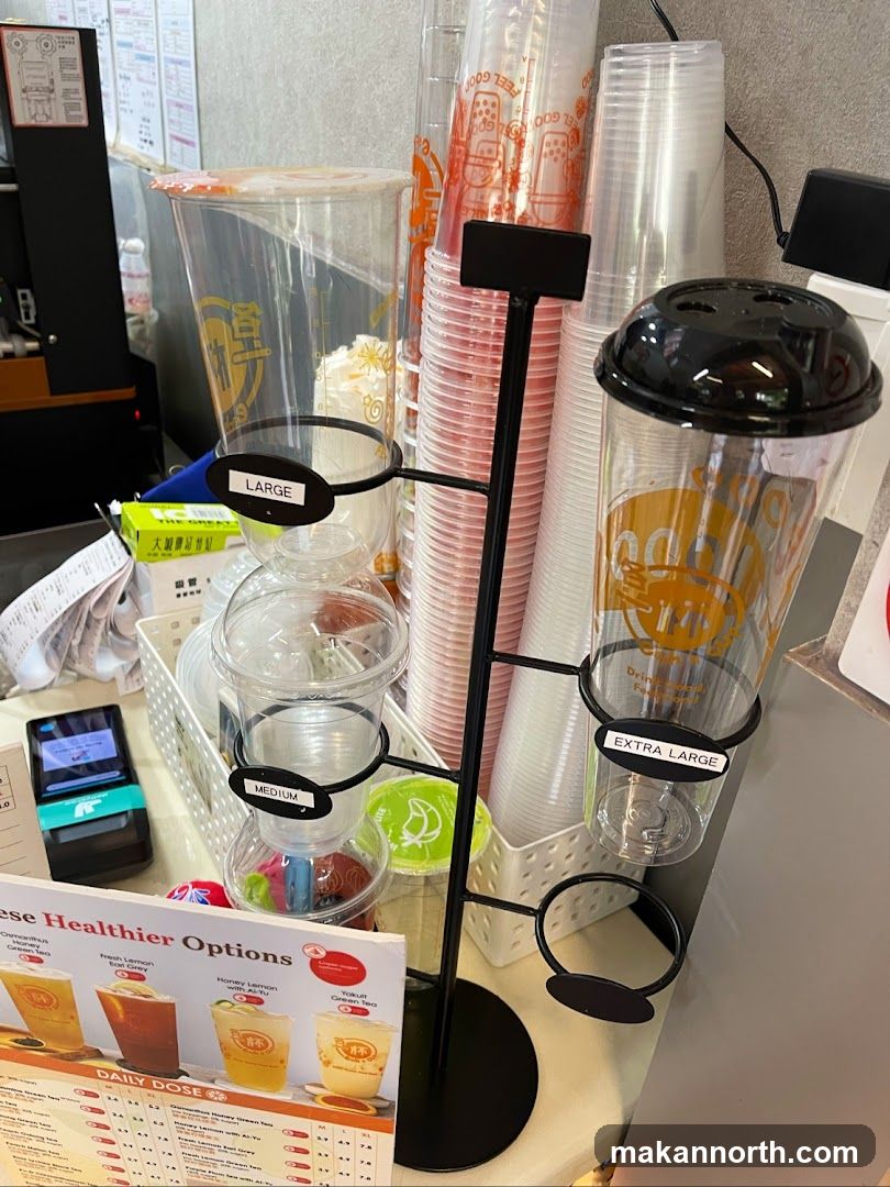 Drink cup dispenser and menu