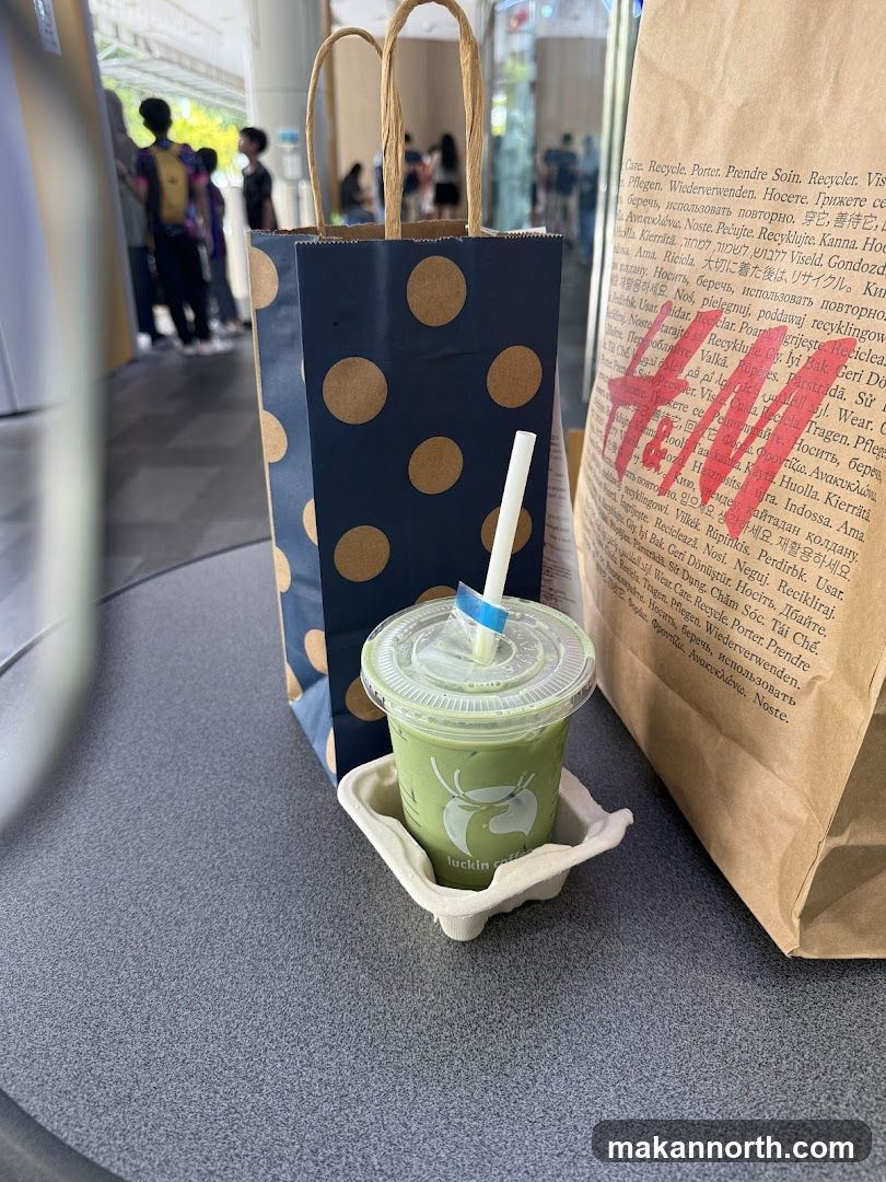 Matcha Drink and Shopping Bags