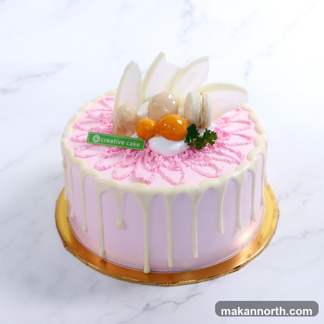 Pink Drip Cake with Fruit Topping