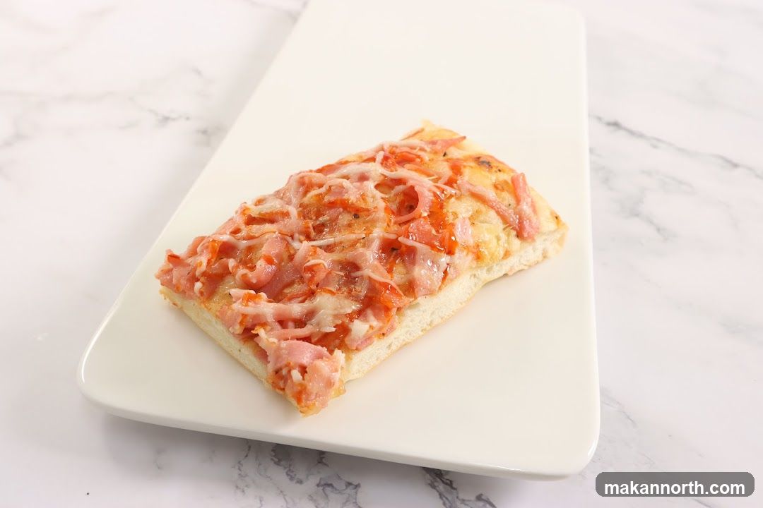 Slice of Ham and Cheese Pizza