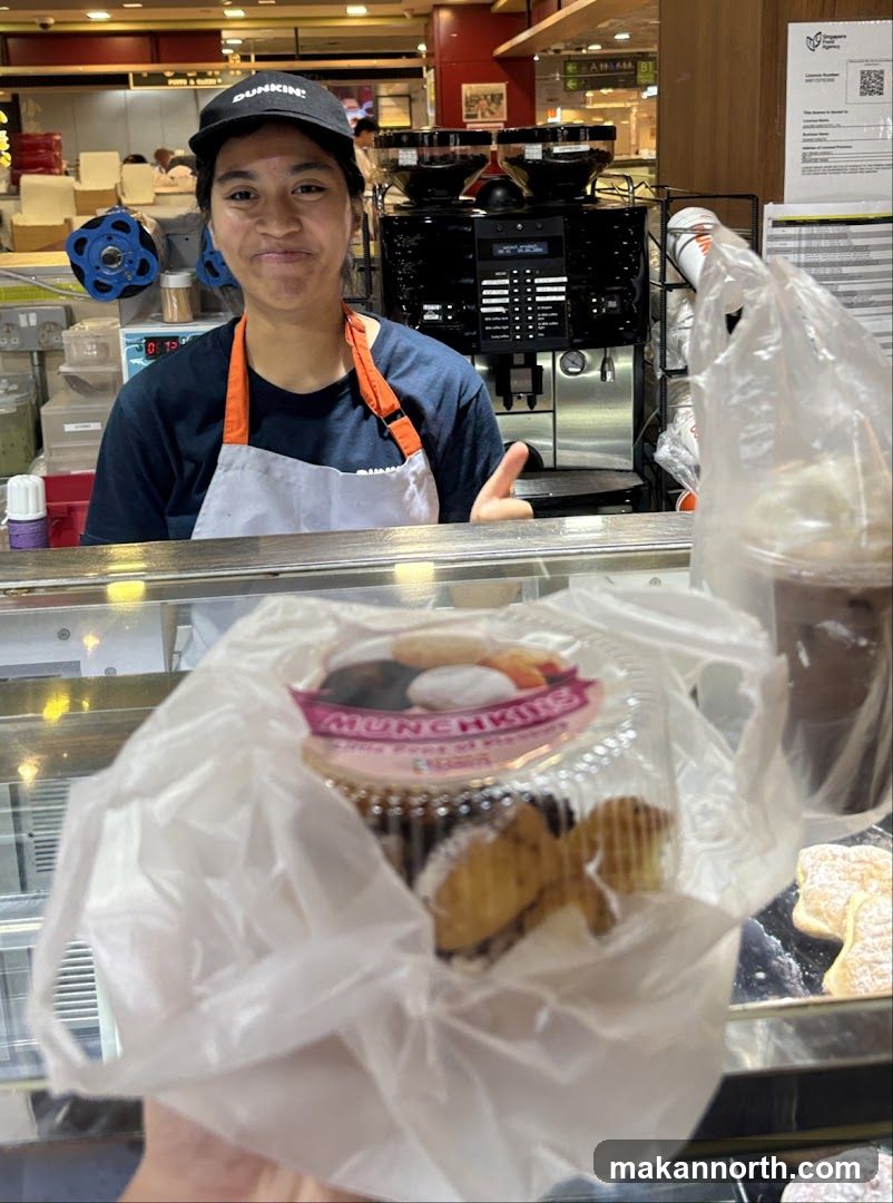 Dunkin' Employee with Munchkins