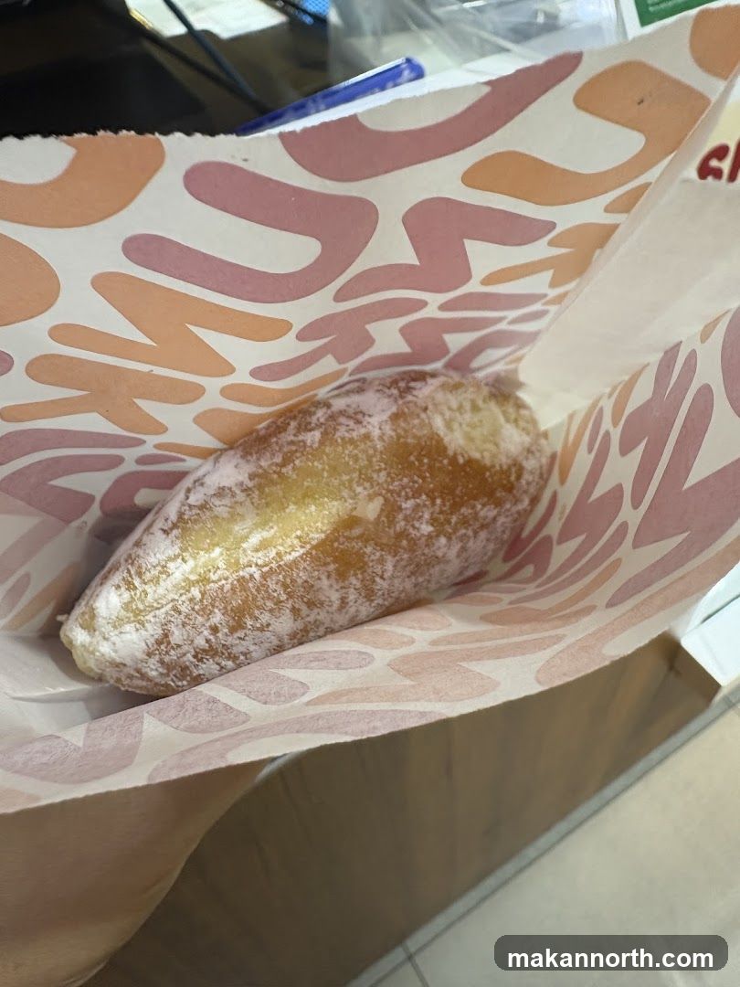Donut in a branded bag
