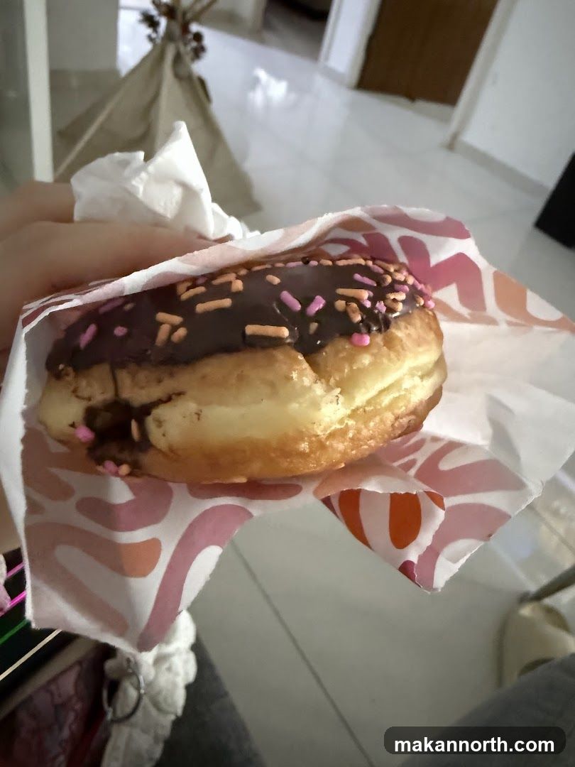 Donut with Chocolate Frosting and Sprinkles