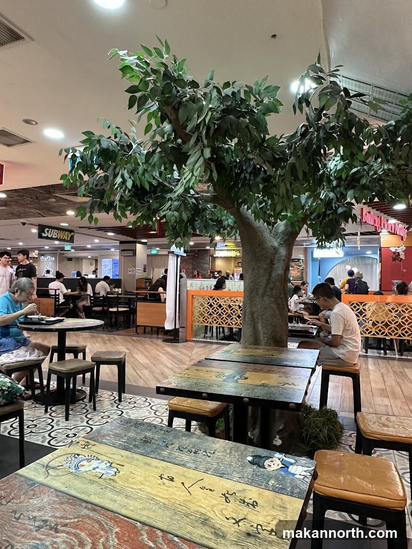 Food court with decorative tree