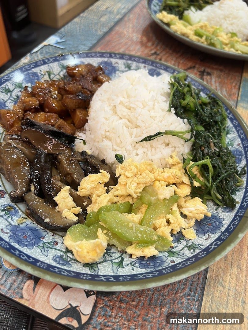 Plate of Rice with Various Toppings