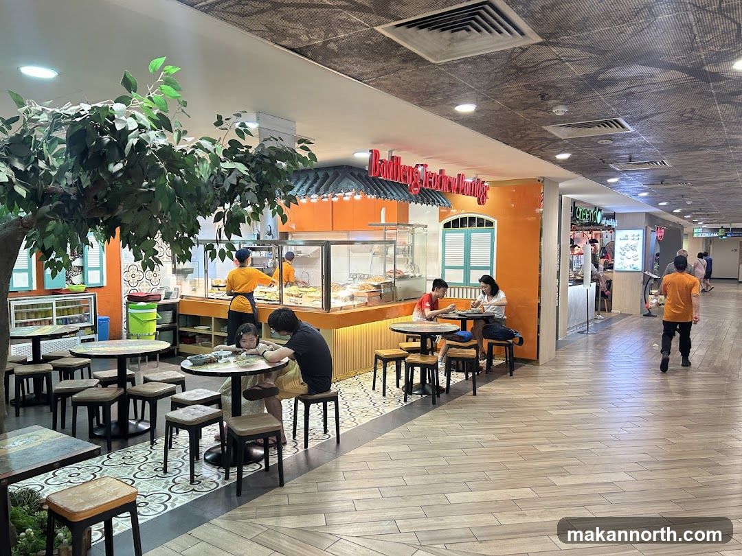 Food court with seating and food stalls