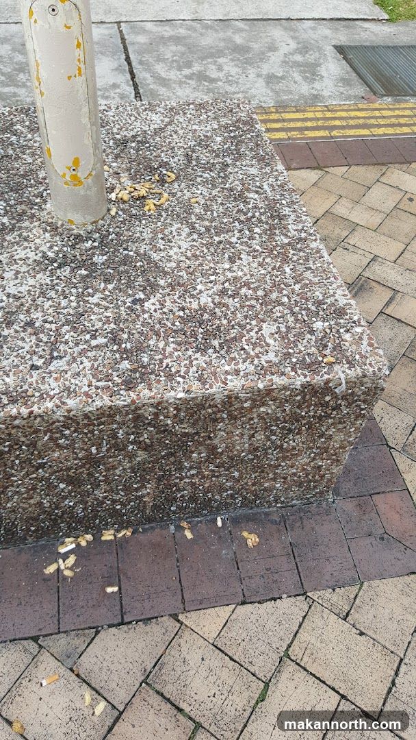 Cigarette Butts on Pavement