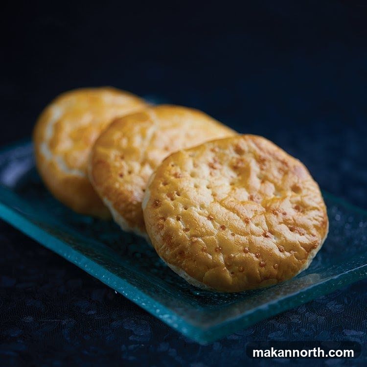 Three Small Breads on a Plate