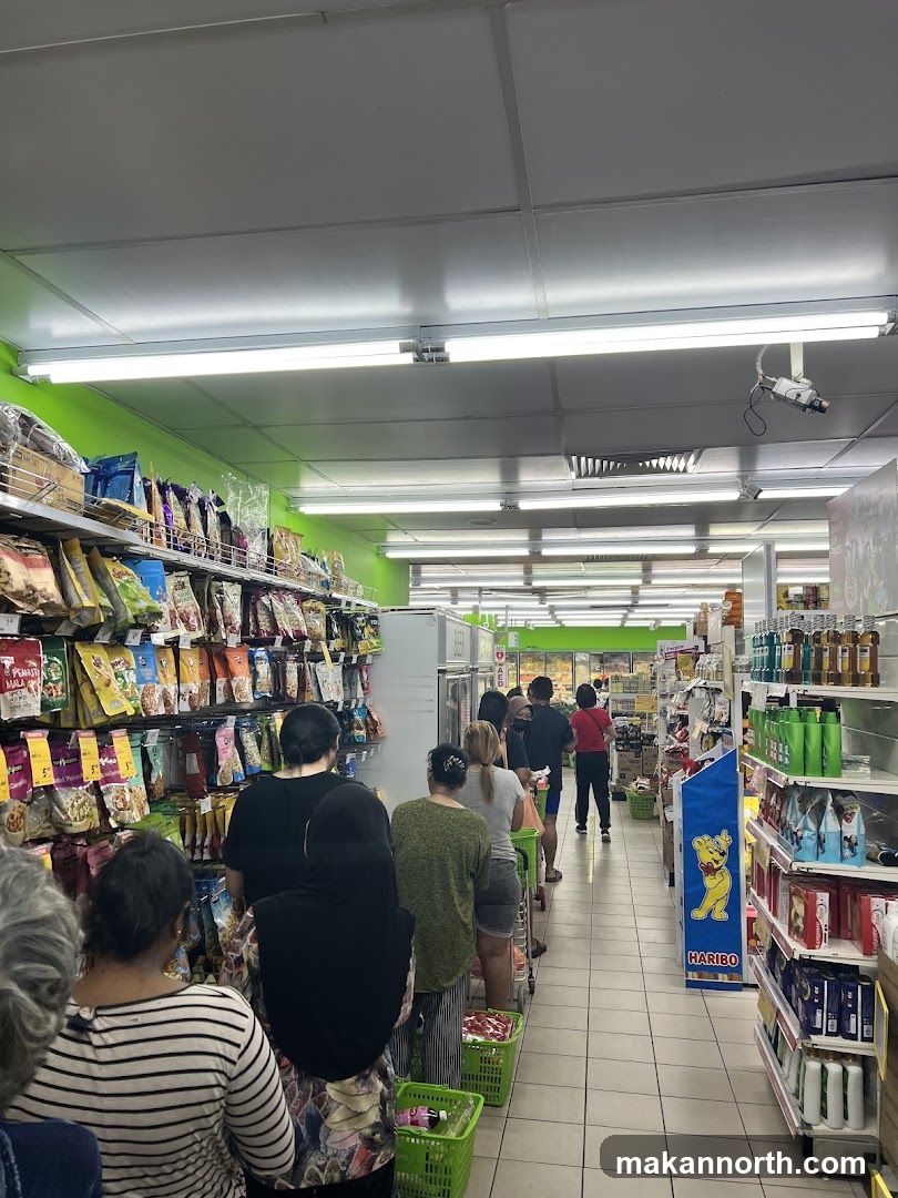 Grocery store aisle with customers