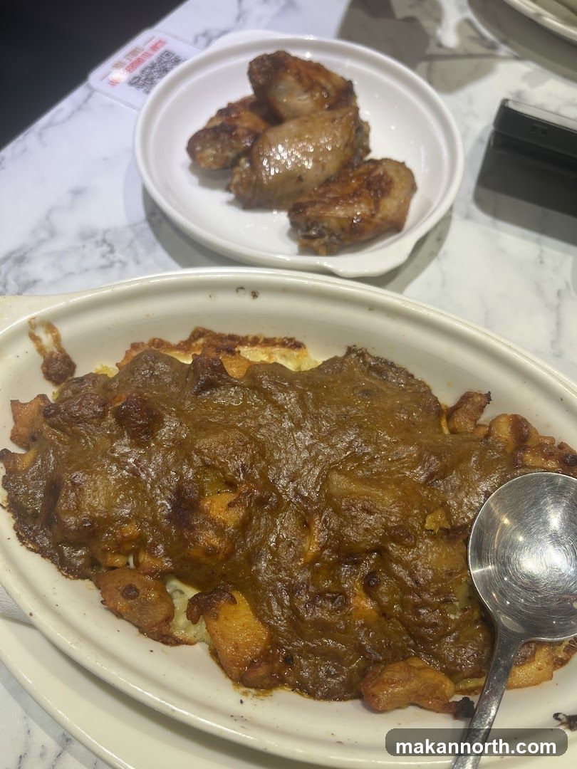 Baked Curry Dish and Chicken Wings