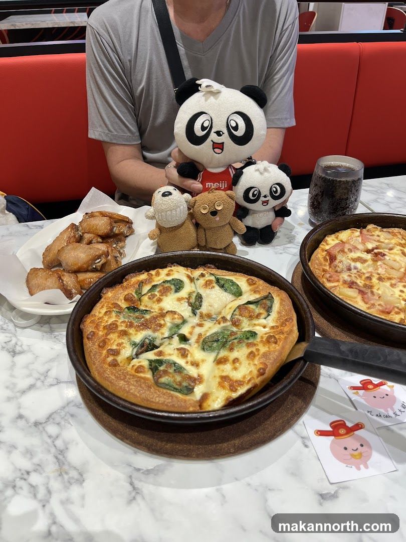 Panda plushies and pizza