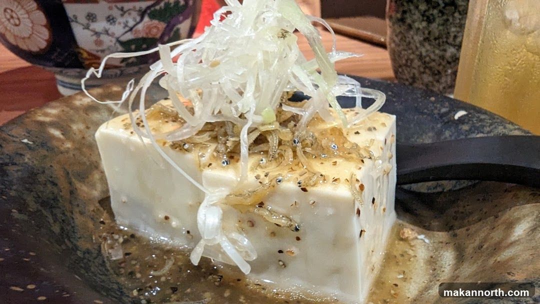 Tofu with small fish and scallions