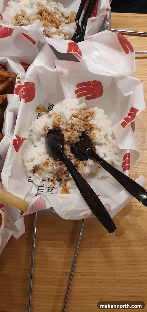 Rice with sauce and cutlery
