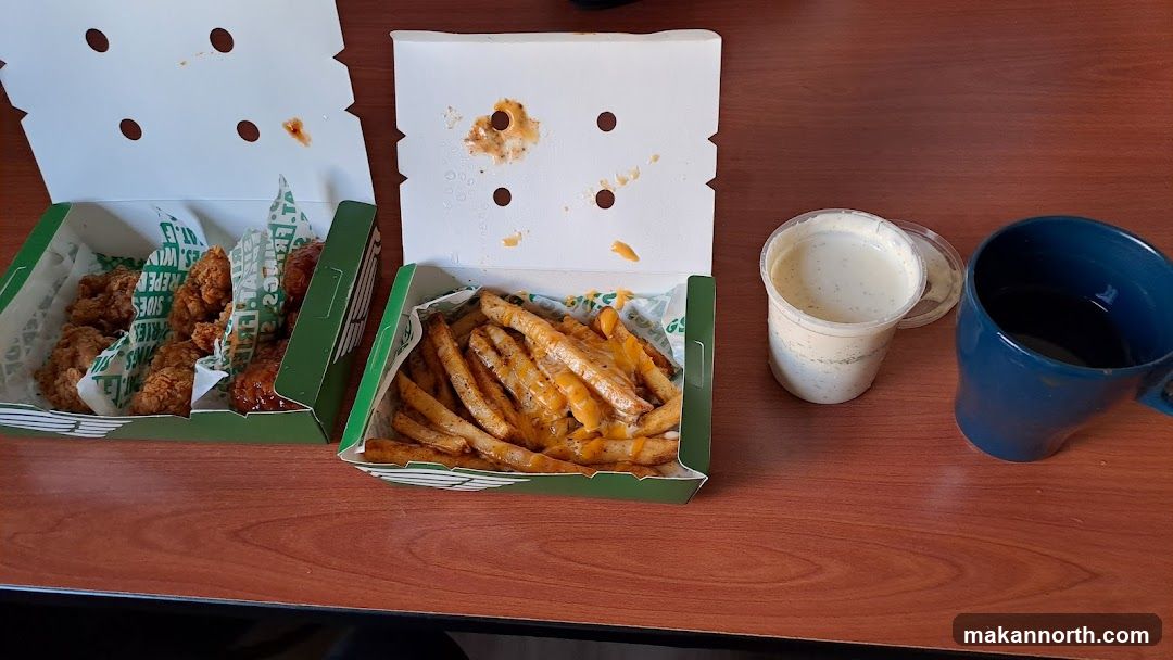 Chicken wings and fries