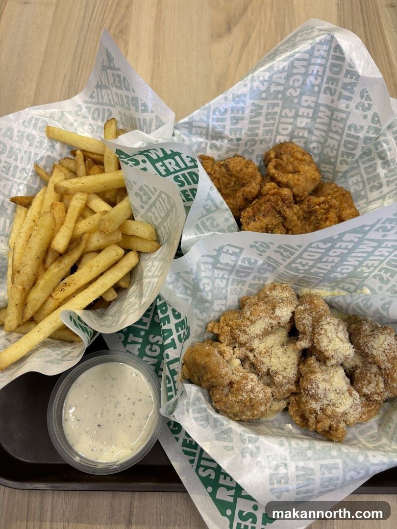 Chicken wings and fries