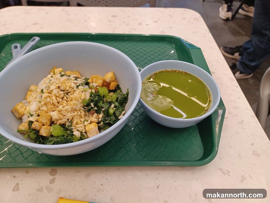 Rice bowl with tofu and greens and a side of green soup