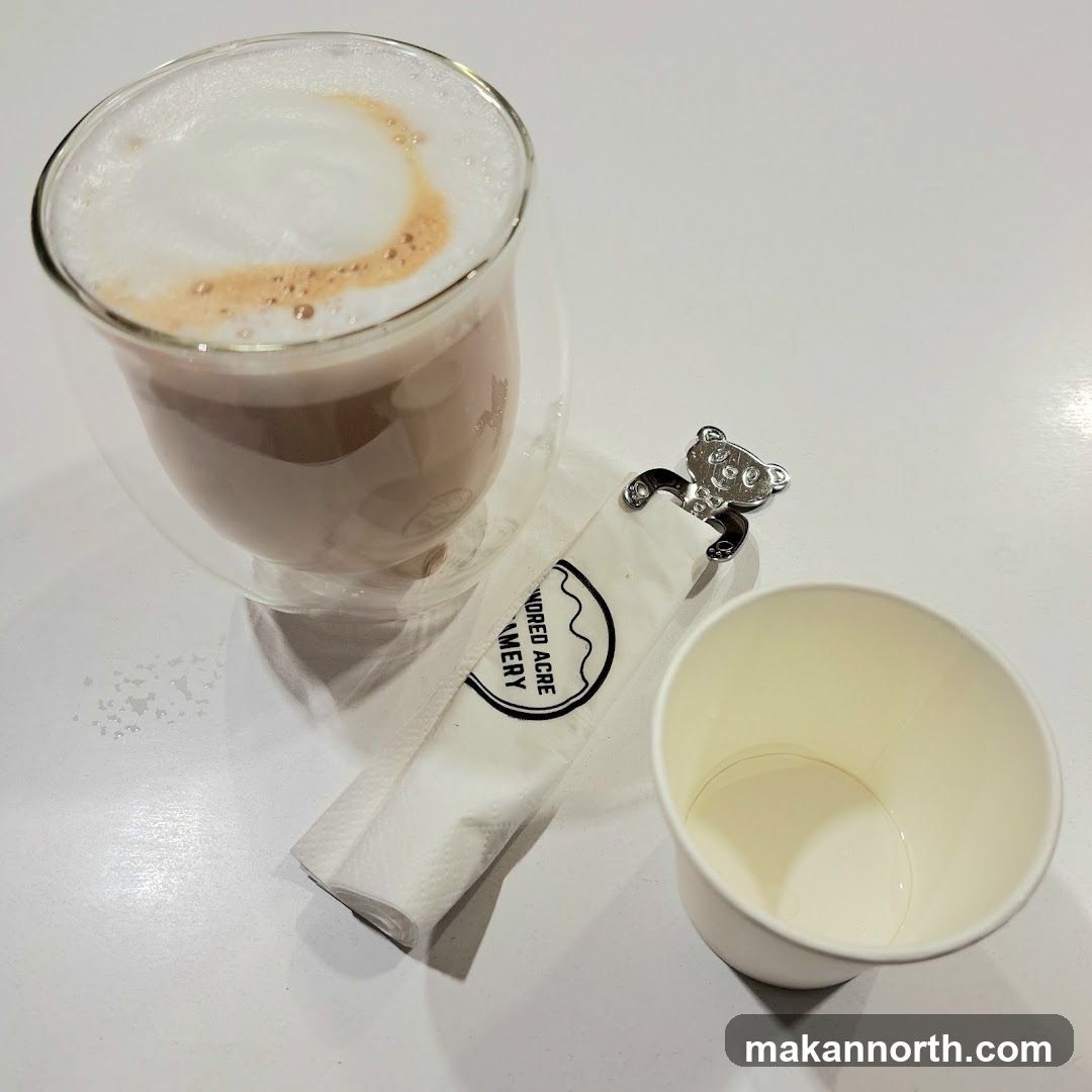 Latte and Empty Cup