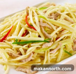 Stir-fried shredded potatoes with pork