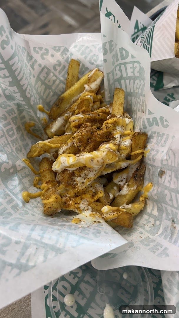 Seasoned Fries with Cheese Sauce