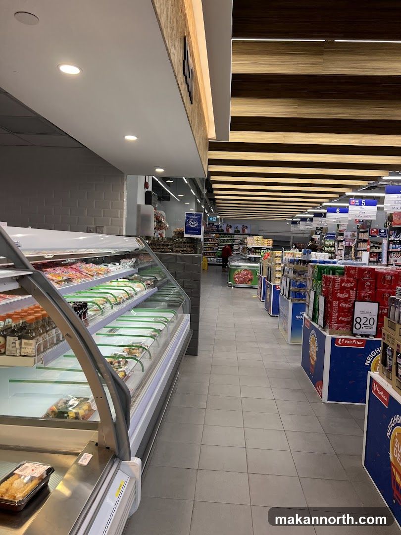 Supermarket aisle with refrigerated display