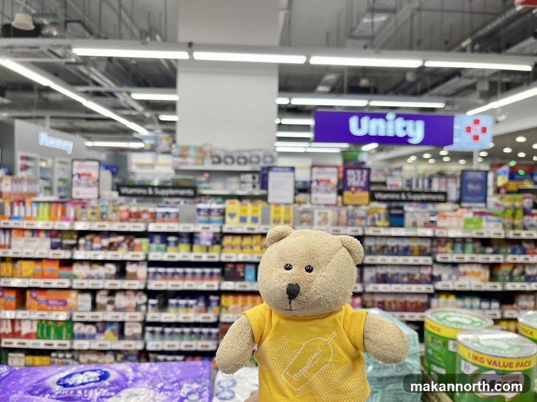 Teddy bear in a supermarket aisle