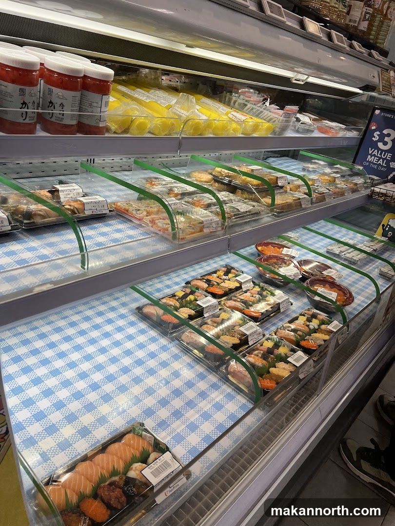 Refrigerated Display Case with Sushi and Pickles
