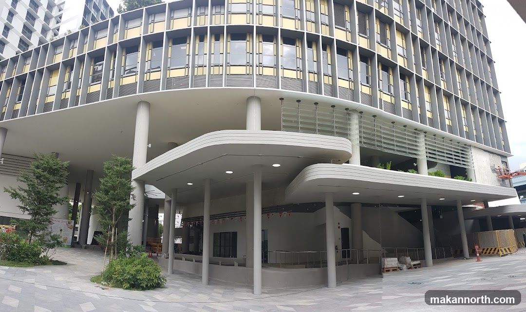 Modern Building Exterior with Outdoor Seating Area