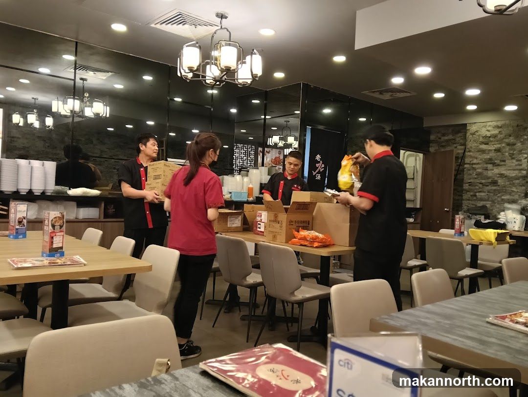 Restaurant Staff Unpacking Supplies