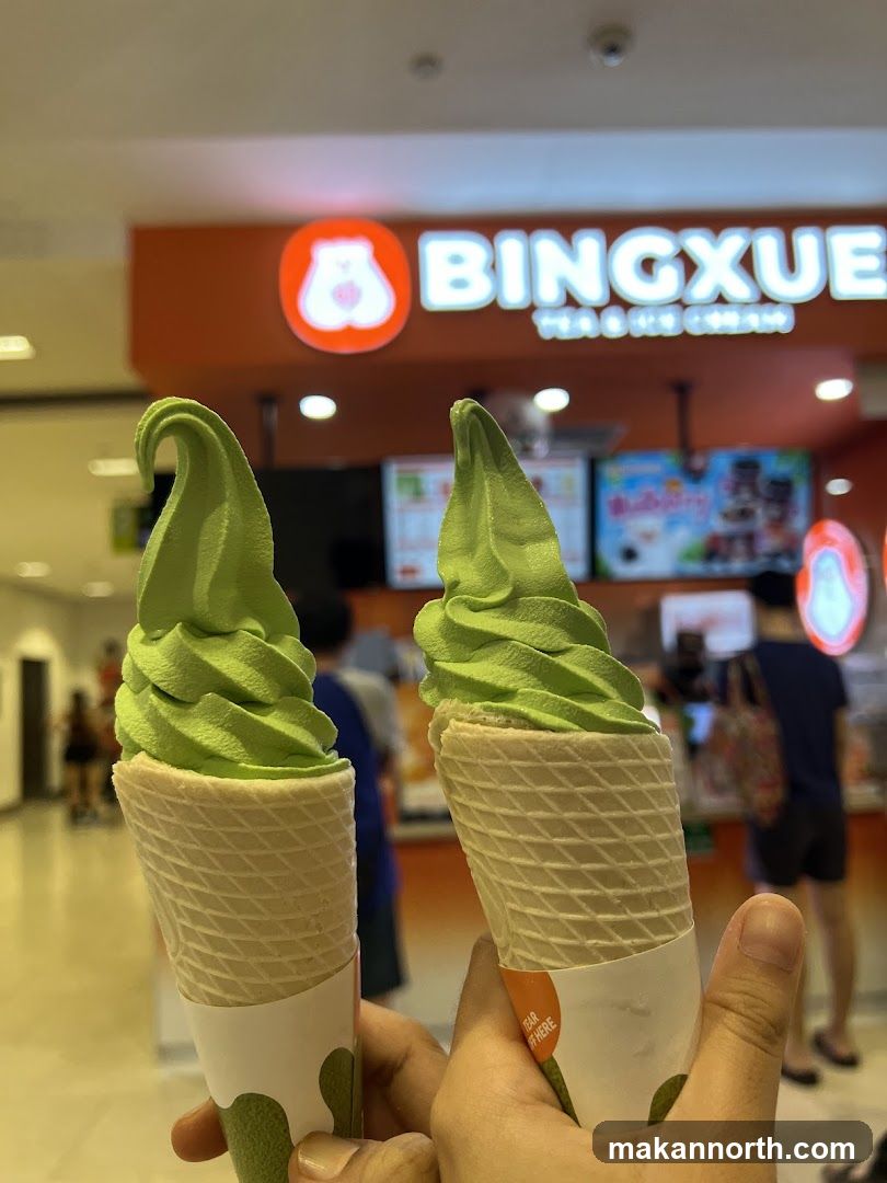 Two Green Soft Serve Ice Creams