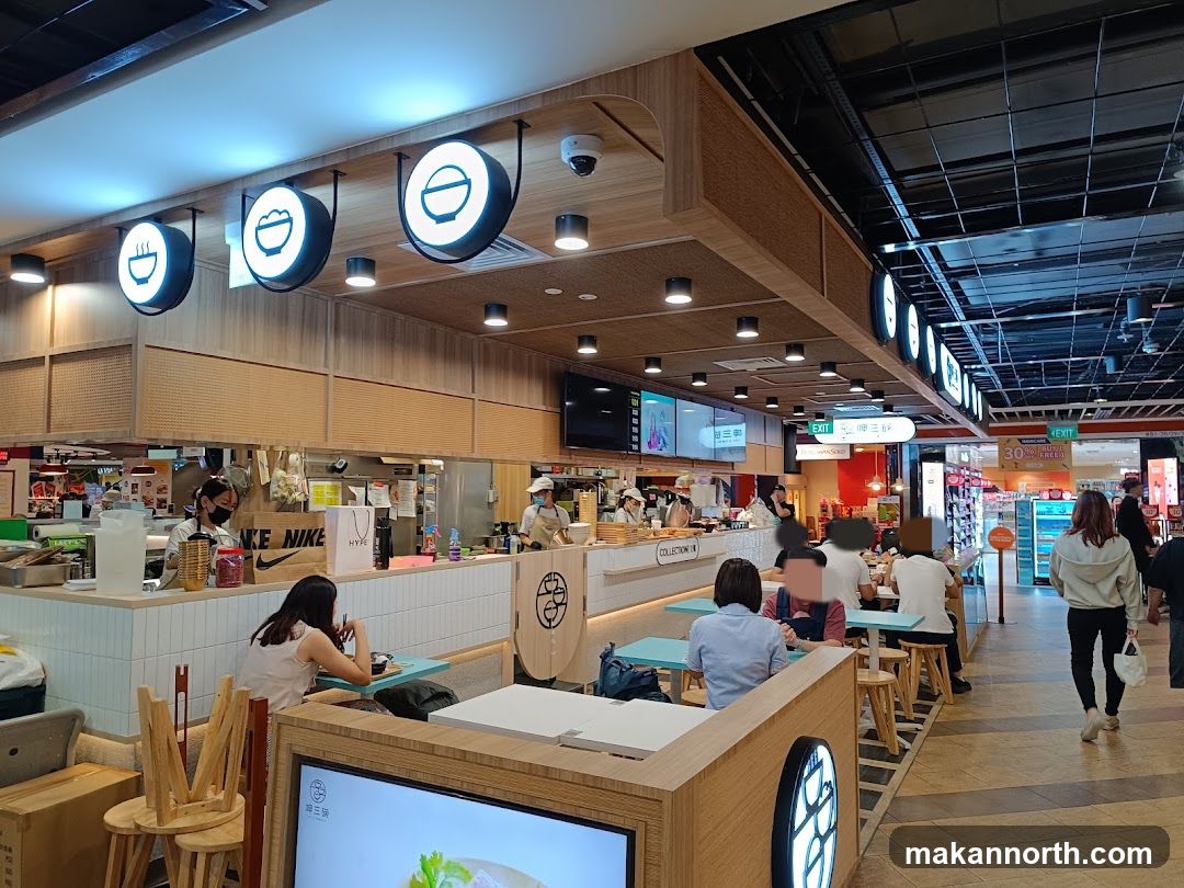 Food court eatery with patrons