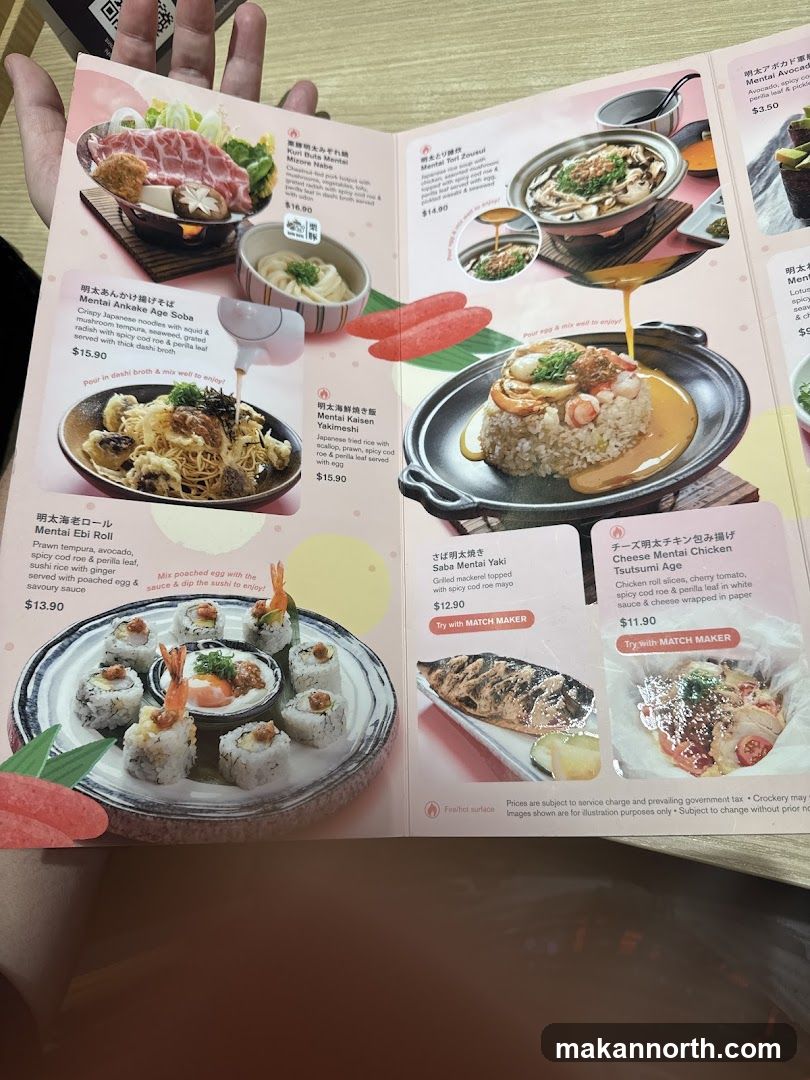 A menu with various Japanese dishes, including noodle dishes, rice dishes, sushi rolls, grilled fish, and chicken wraps.