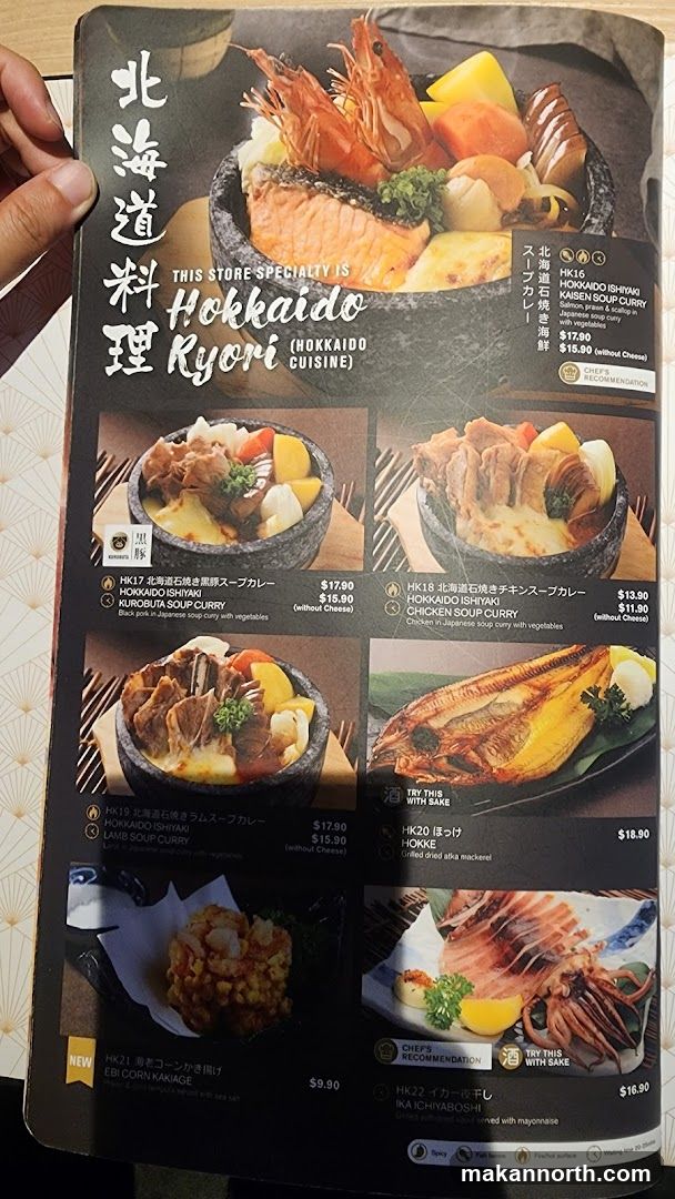 A menu featuring Hokkaido cuisine, with a focus on Ishiyaki soup curries and other Japanese dishes.